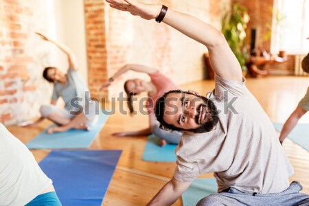 [[stock_photo]]: Groupe · de · gens · yoga · lièvre · posent · studio · fitness