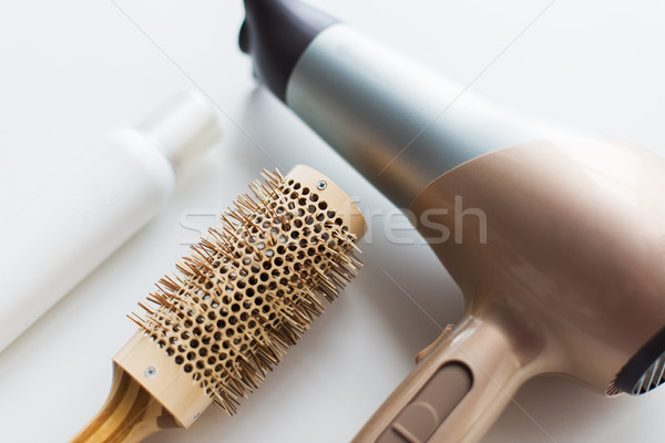 hairdryer, brush and hot styling hair spray Stock photo © dolgachov