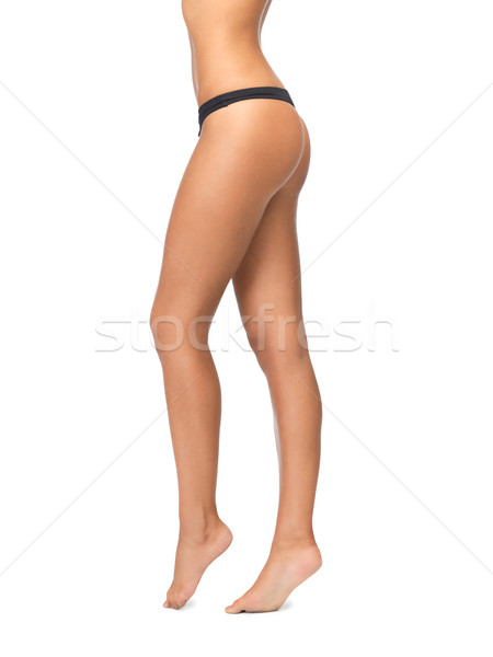 Weiblichen Beine schwarz bikini Höschen Bild Stock foto © dolgachov