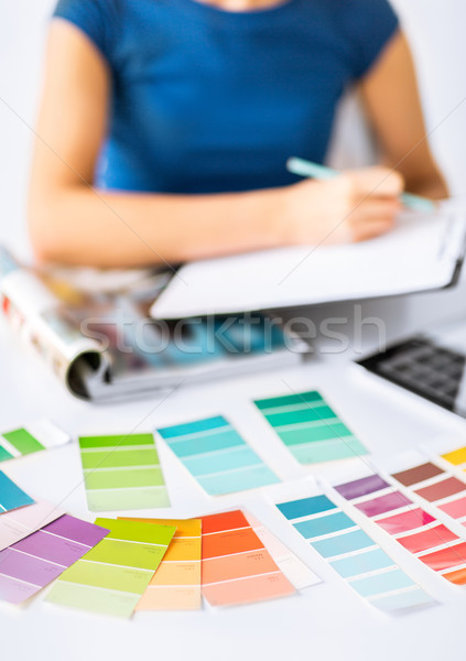 Stock photo: woman working with color samples for selection