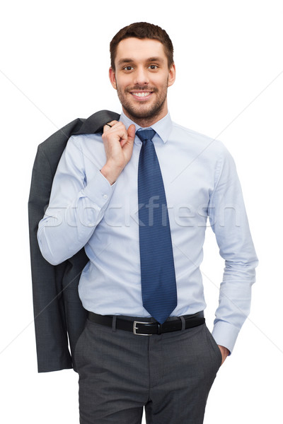 Stock photo: handsome buisnessman with jacket over shoulder
