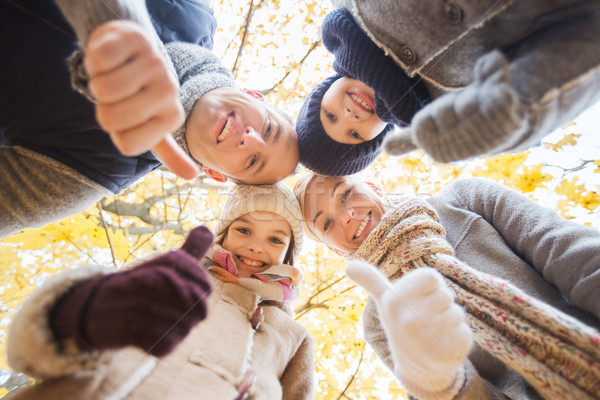 happy family in autumn park Stock photo © dolgachov