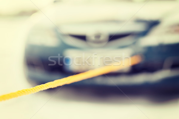 closeup of towed car with towing rope Stock photo © dolgachov