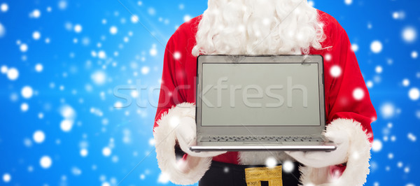 Święty mikołaj laptop christmas reklama technologii Zdjęcia stock © dolgachov