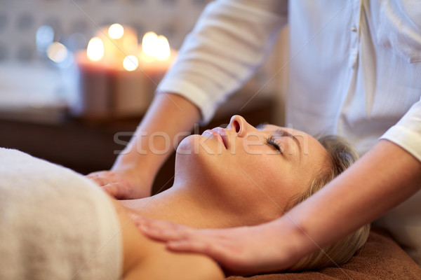 close up of woman lying and having massage in spa Stock photo © dolgachov