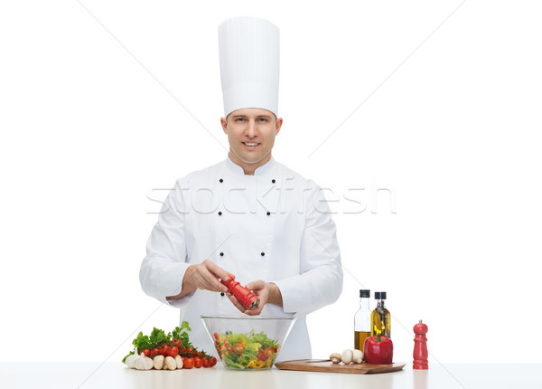 happy male chef cook cooking food Stock photo © dolgachov