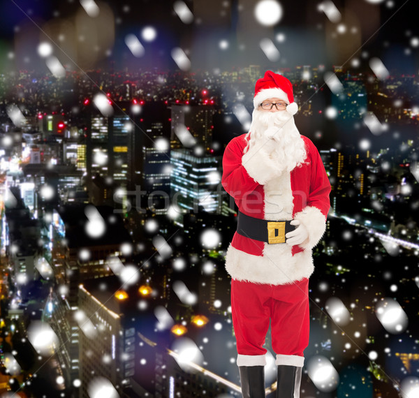 man in costume of santa claus Stock photo © dolgachov