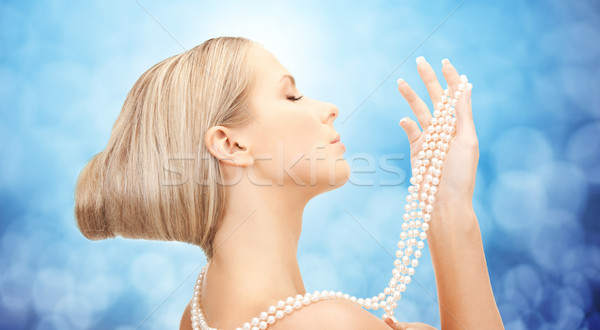 Belle femme mer perle collier bleu beauté [[stock_photo]] © dolgachov