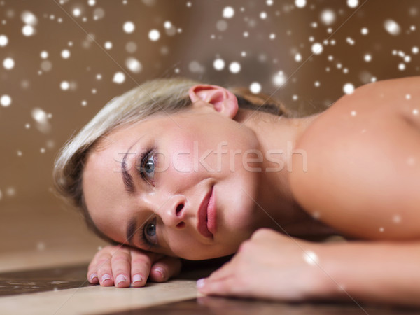 young woman lying on hammam table in turkish bath Stock photo © dolgachov