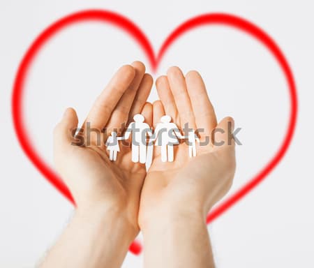 Stock photo: close up of happy male gay couple with love symbol