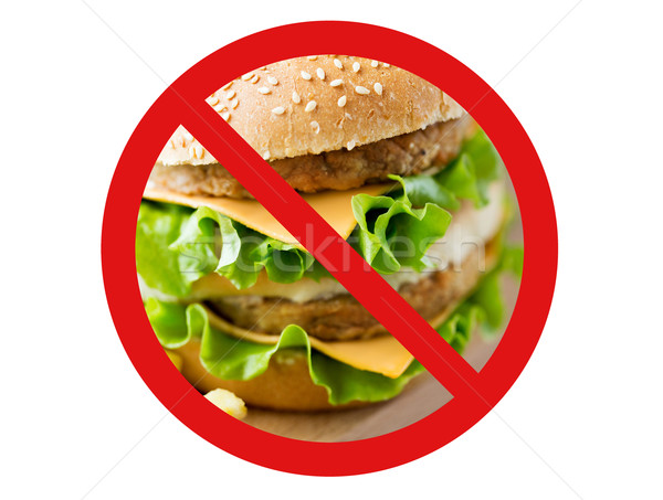 Közelkép hamburger mögött nem szimbólum gyorsételek Stock fotó © dolgachov