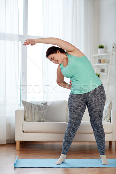 Plus size nő testmozgás otthon fitnessz sport Stock fotó © dolgachov