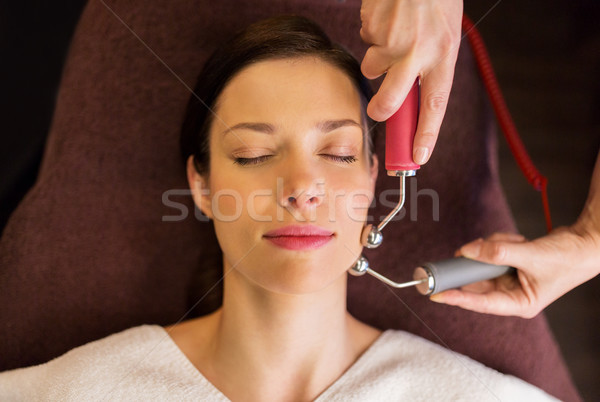 woman having hydradermie facial treatment in spa Stock photo © dolgachov