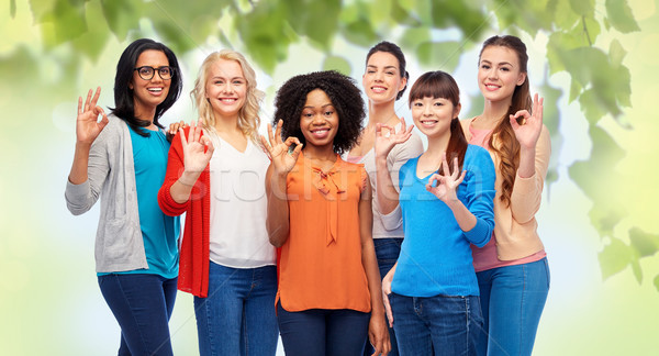 international group of happy women showing ok Stock photo © dolgachov