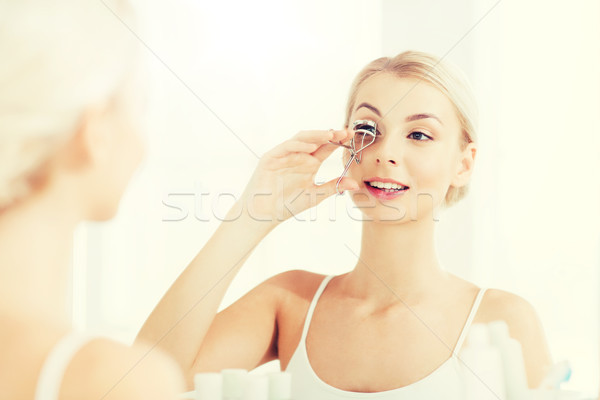 女子 睫毛 浴室 美女 彌補 化妝品 商業照片 © dolgachov