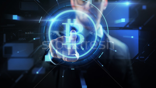 Közelkép üzletember bitcoin hologram pénzügy üzlet Stock fotó © dolgachov