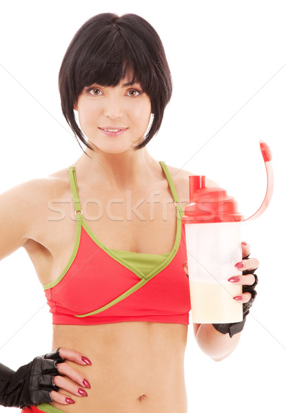 Uygunluk eğitmen protein sallamak şişe kadın Stok fotoğraf © dolgachov