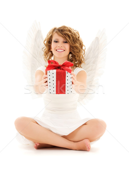 Ange cadeau photos heureux adolescent fille [[stock_photo]] © dolgachov