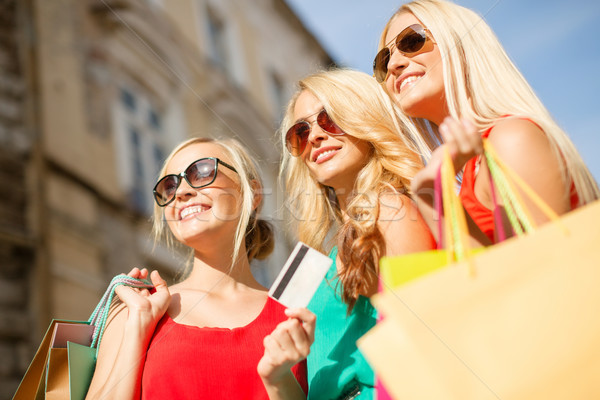 beautiful women with shopping bags in the ctiy Stock photo © dolgachov