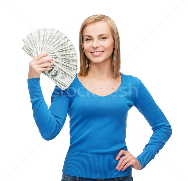 Uśmiechnięty dziewczyna Dolar pieniężnych ceny Zdjęcia stock © dolgachov