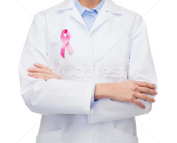 Stock photo: female doctor with breast cancer awareness ribbon