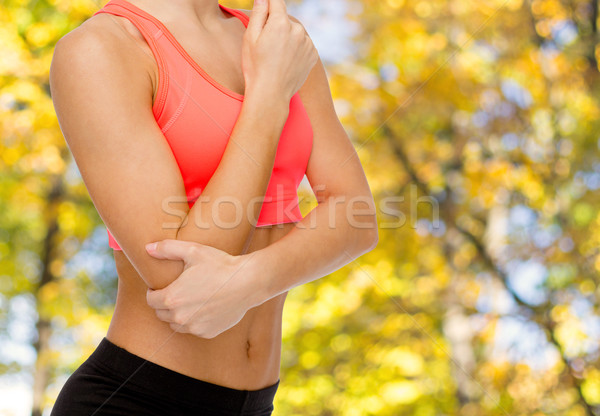 Kadın ağrı dirsek sağlık uygunluk Stok fotoğraf © dolgachov