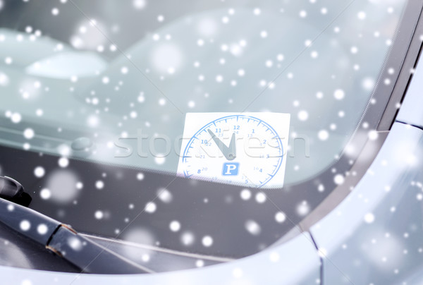 close up of parking clock on car widow Stock photo © dolgachov