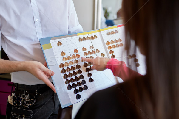 woman choosing hair color from palette at salon Stock photo © dolgachov