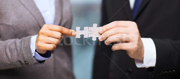 Stockfoto: Zakenman · zakenvrouw · puzzelstukjes · business · kantoor