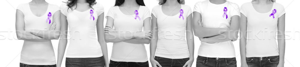 Stock photo: close up of women with purple awareness ribbon