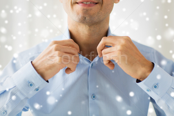 Lächelnd Mann Shirt Zurichtung Menschen Stock foto © dolgachov