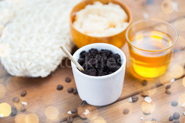 close up of coffee scrub in cup and honey on wood Stock photo © dolgachov