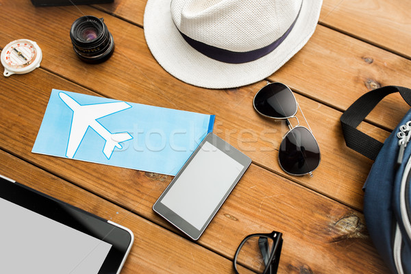 close up of gadgets and traveler personal stuff Stock photo © dolgachov