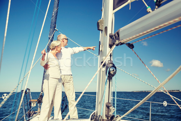 Idős pár ölel vitorla csónak jacht tenger Stock fotó © dolgachov
