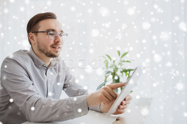 Stock photo: happy creative male office worker with tablet pc