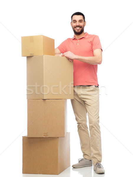 Boldog férfi karton dobozok házhozszállítás mozog Stock fotó © dolgachov