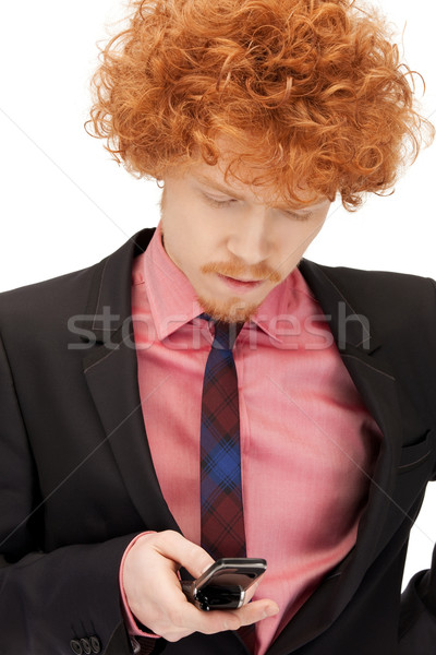 handsome man with cell phone Stock photo © dolgachov