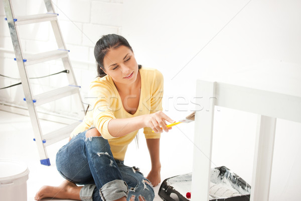 lovely housewife painting Stock photo © dolgachov