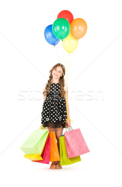Pequeño niña feliz globos blanco Foto stock © dolgachov