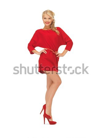 lovely woman in red dress on high heels Stock photo © dolgachov