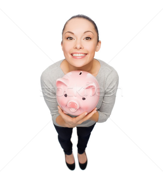happy woman with piggy bank Stock photo © dolgachov