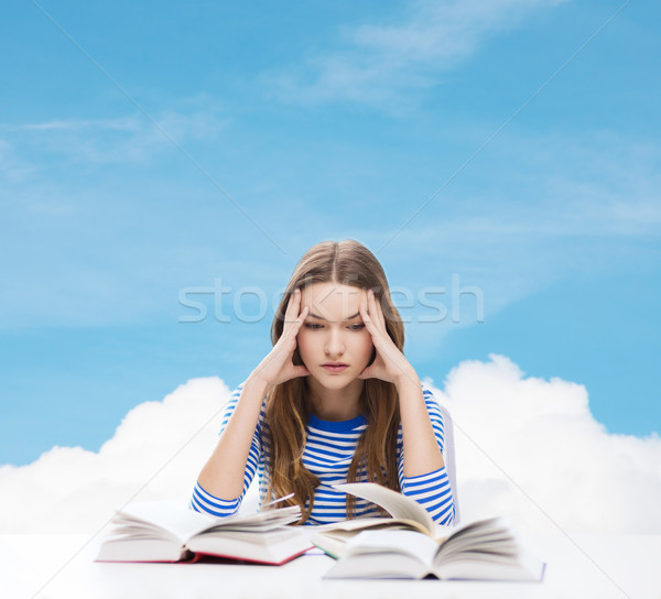 stressed student girl with books Stock photo © dolgachov