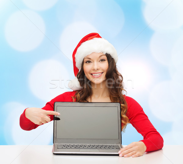 ストックフォト: 笑顔の女性 · サンタクロース · ヘルパー · 帽子 · ノートパソコン · クリスマス