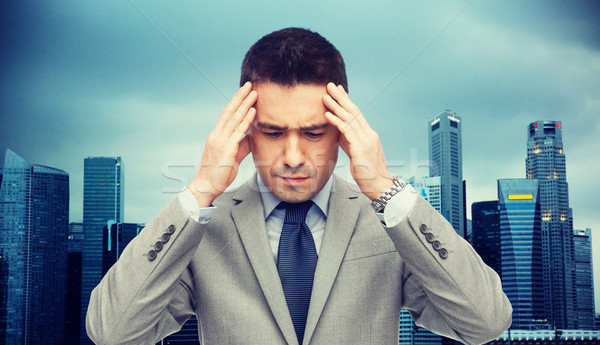 бизнесмен костюм голову боль деловые люди кризис Сток-фото © dolgachov