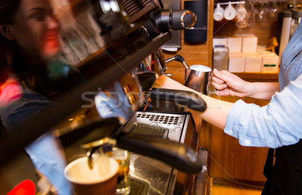 close up of woman making coffee by machine at cafe Stock photo © dolgachov