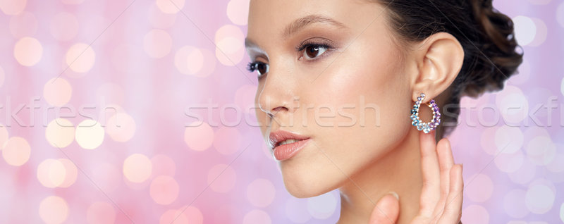 красивая женщина лице серьга красоту ювелирные Сток-фото © dolgachov