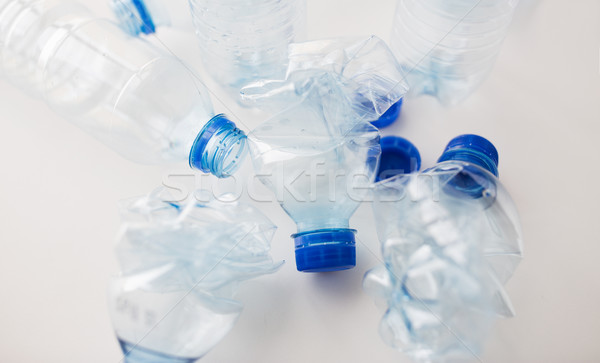 close up of empty used plastic bottles on table Stock photo © dolgachov