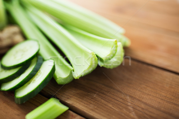 close up of celery stems and sliced cucumber Stock photo © dolgachov