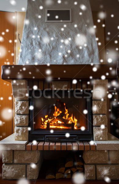 Közelkép égő kandalló hó tél karácsony Stock fotó © dolgachov