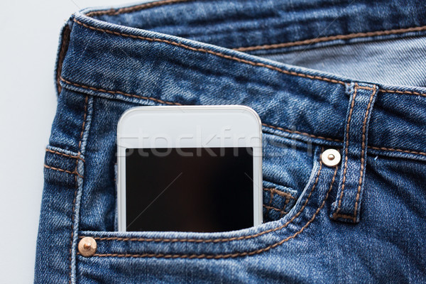 Smartphone kieszeni denim spodnie dżinsy technologii Zdjęcia stock © dolgachov